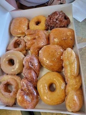 A mixed dozen donuts, all fresh