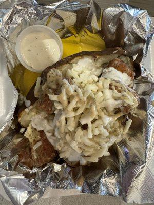 Loaded garlic parm chicken potato .