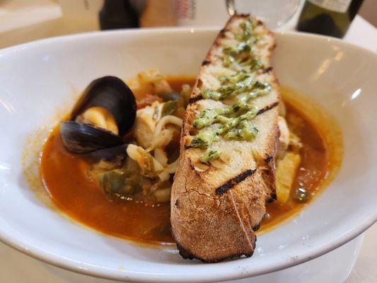 Secondi: Cioppino, Fin Fish, Shell Fish, Fennel, Crostini with Pesto Butter.