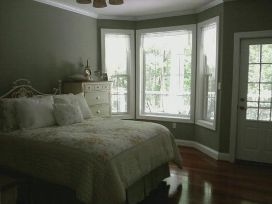 Behr textured seafoam green paint in Guest bedroom.  Ceiling bright white and trim gloss white.  Completed on July 17, 2012.