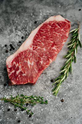 WAGYU NEW YORK STRIP STEAK - With just the right amount of marbling and tenderness, this cut is sure to please everyone.