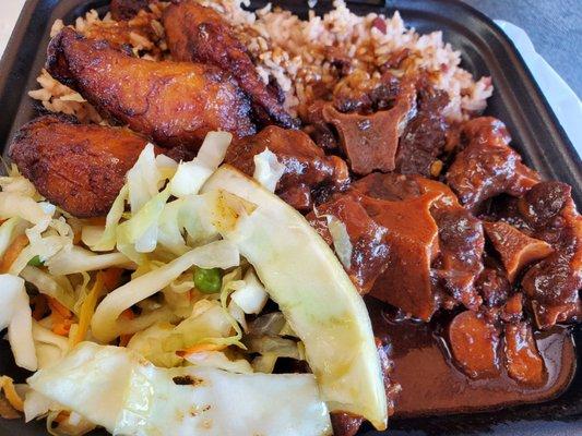 Ox tails, rice and peas, cabbage and plantains