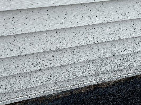 My new garage siding covered in tar.