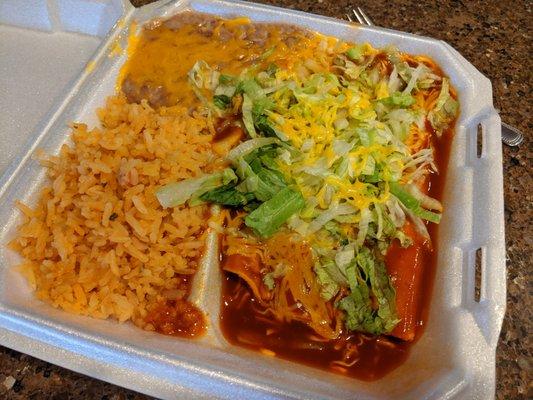 Cheese enchiladas with rice and beans.