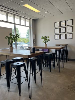 Pretty light-filled dining area with real plants