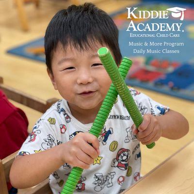 Kids love Kiddie Academy's music program!