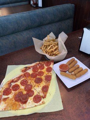 Two slices of pepperoni pizza French fries  Mozzarella sticks