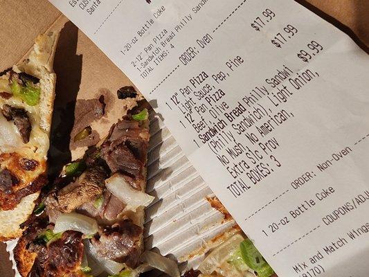 Receipt with detail and mushrooms on sandwich