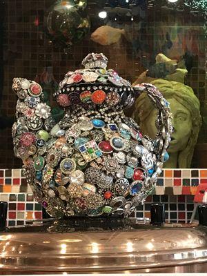 Bejeweled teapot fits the decor!