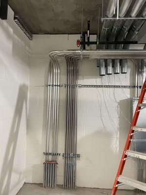 Conduit rack to supply branch circuitry