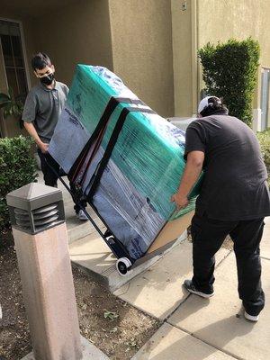 Piano move down 2 flights of stairs.