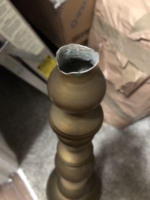 Part of a brass candle stick holder