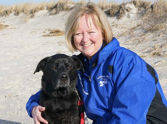 Ruth Moore is the owner and you often see her accompanied by her dog, Titan.