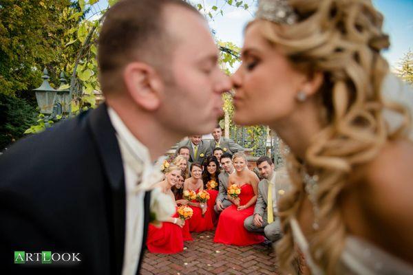 bride and groom kiss