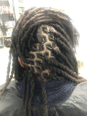 Two strand twist on locs