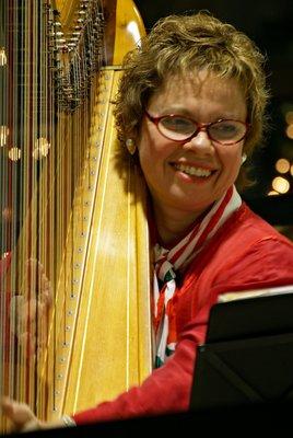 Janice Ortega in performance entertaining shoppers during a seasonal holiday