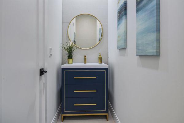 The designer aimed for a "beachy" feel with the Adrian vanity in the shade of Navy Blue