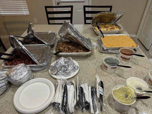 Pastor, asada, rice, beans, chips, and extras