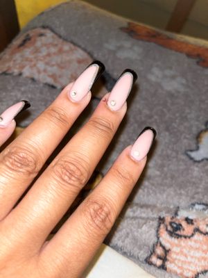 (Picture of my cut from nail salon, and half missing gem)