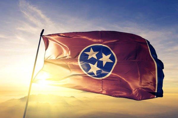 The three stars represent the three grand divisions of the state. West, Middle and East Tennessee.