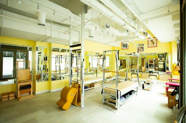 A fully equipped Pilates studio.