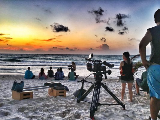 Filming on the white sand beaches of Tulum