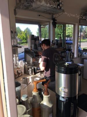 Hard at work cranking out coffee for the morning rush! Fine work my friend!