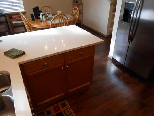 Redmond remodel- quartz counters, glass tile backsplash, hardwood flooring, tile shower and floors.