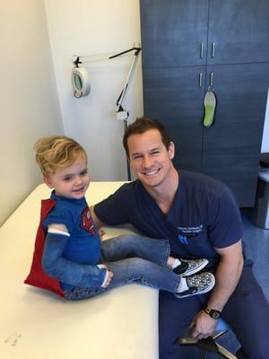 Dr Tim Hartshorn with my son, Graham. His first (and hopefully only) cast!