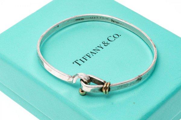 TIFFANY & CO. STERLING SILVER AND 14K YELLOW GOLD HOOK AND EYE BRACELET, WITH BOX