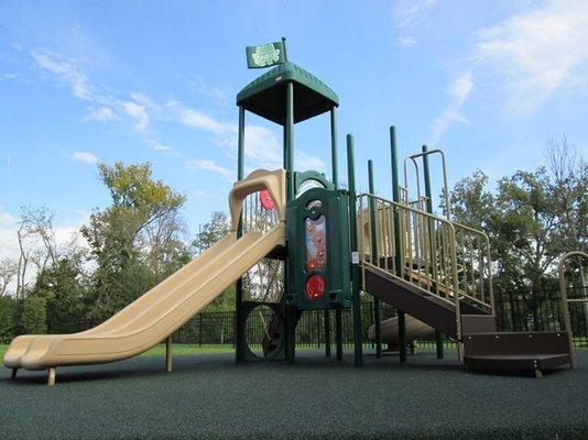 Our playground equipment provides lots of fun for our children.