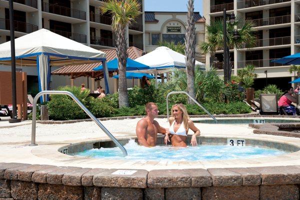 Couple in outdoor hot tub