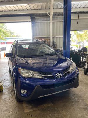 Customers car inside shop