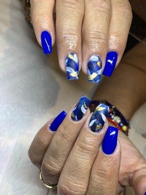 Acrylic nails with gel polish.