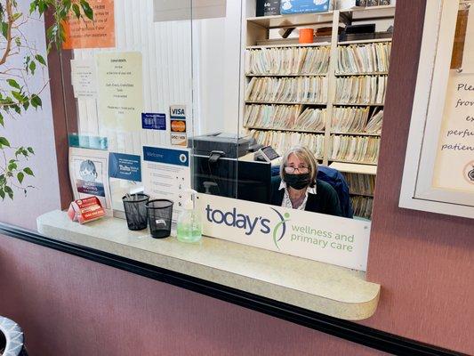 Our trusted staff, Betty warmly welcoming patients.