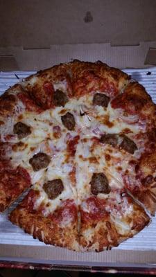 Medium pizza with sausage and onions