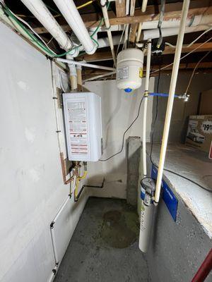 Tankless water heater installations and replacing tank water heaters with tankless.