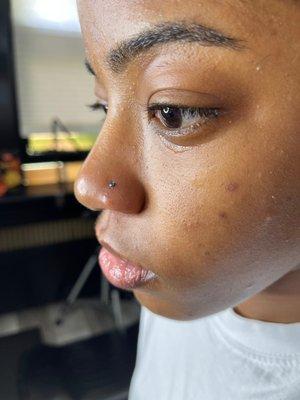 Nose piercing.