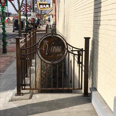 Patina hand Rail and custom CNC sign