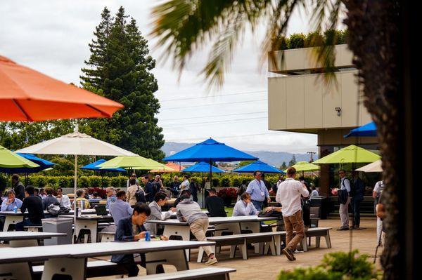 Teams enjoy lunch on the second floor patio.