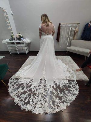 An absolutely beautiful train on this dress.