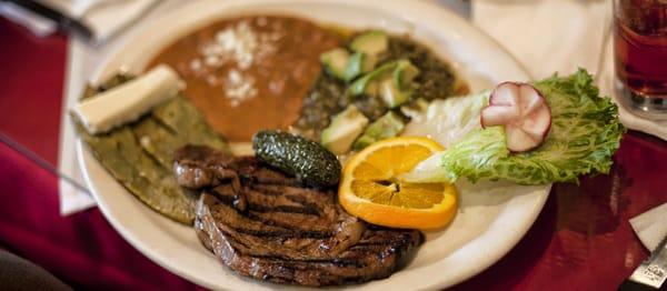 steak, cactus, and green sauce