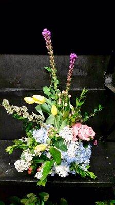 I asked for unique, creative, asymmetrical, not bushy, colorful and this is what they created!  My mom LOVES her birthday arrangement!!!!!