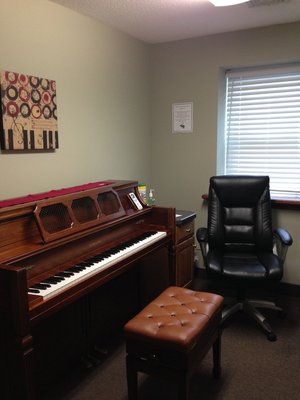 One of our piano rooms, housing an upright piano.