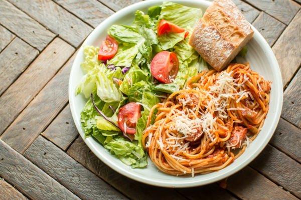 Homemade Spaghetti And Meatballs With A Side Salad and Crusty Garlic Bread