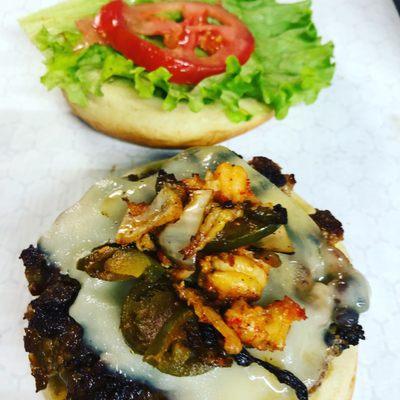 Swamp Burger: Grilled Crawfish Tails, Jalapenos, Onions served with Pepper Jack Cheese and Pepper Jelly Mayo