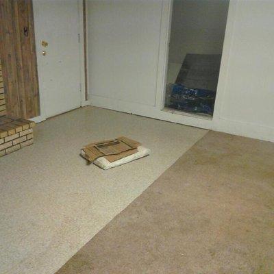 Laying VCT flooring in Den of a house -Finished photo