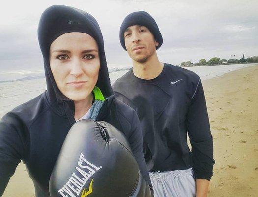 Boxing with a gym goer on the beach in Alameda.