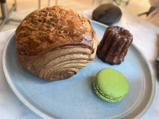 Chocolate croissant, pistachio macaron, canelé