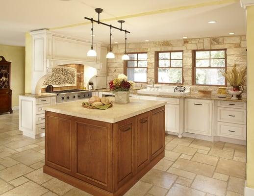 Hill Country style kitchen in Grand Prairie, Texas. Island of pecan wood with 2" thick solid Texas limestone counter top.